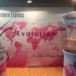 "Evolution" Hair Trade Show Booth - back drop, product display shelf and podiums.